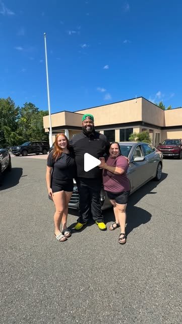 Congratulations @theyluvyagirl.lay — three customers standing in front of their new car at the lot